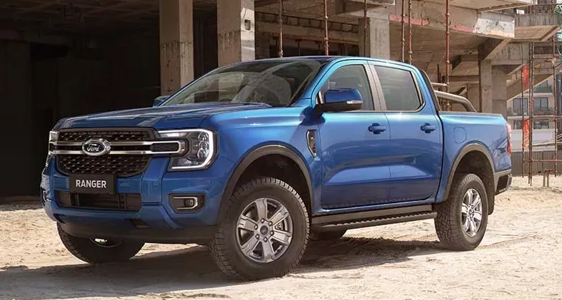 A blue Ford Ranger dual cab ute on a building site