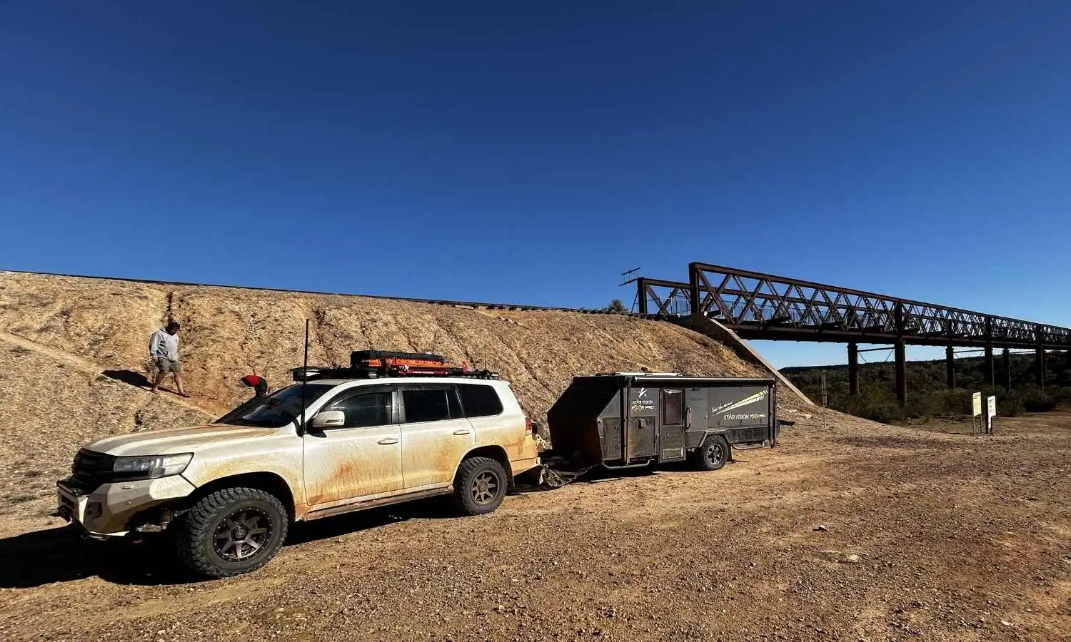 Caravan tow set up on a dusty outback gravel road